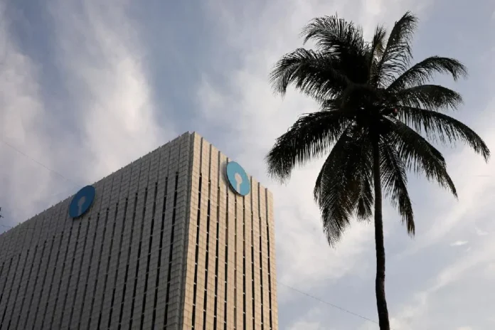 File photo: The logo of State Bank of India (SBI) is seen on the facade of its headquarters in Mumbai, India, April 12, 2023. Reuters