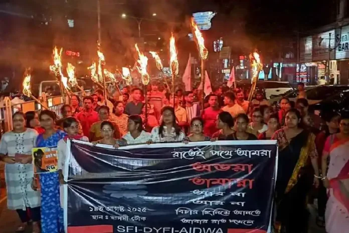 Members of Left organisations take out a torch march in Siliguri on Thursday night to demand justice for the murdered junior doctor. Picture by Passang Yolmo/The Telegraph