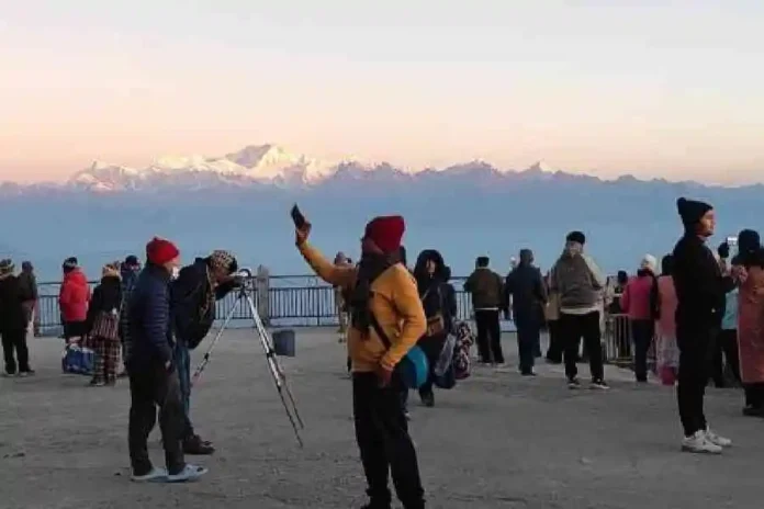 Some of the few tourists who made it to Tiger Hill in Darjeeling on Friday morning. Source: The Telegraph