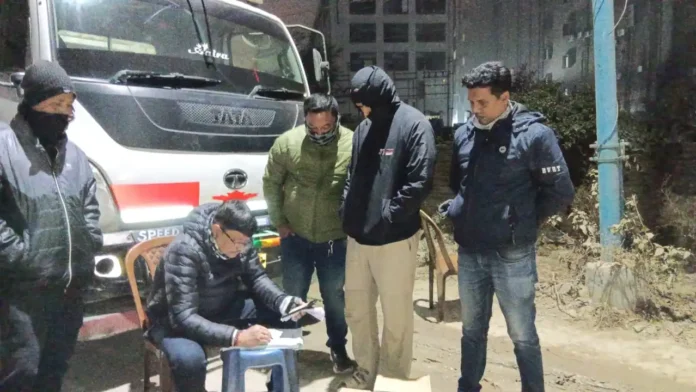 Police Question Driver and Check Papers After Liquor Seizure Ahead of New Year. Siliguri, 30 December 2025.