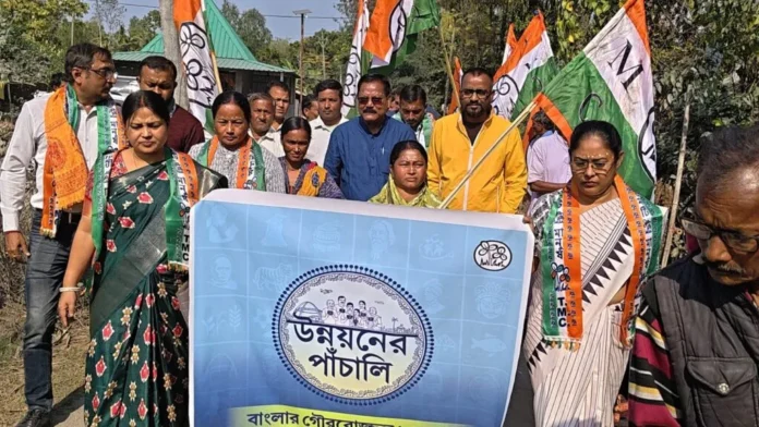 TMC leaders and workers begin the ‘Unnayan Samvad Yatra’ in Rajganj after offering prayers at a local temple on Tuesday.