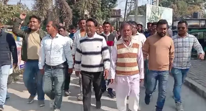 Trinamool Congress leaders and supporters take out a rally in Jalpaiguri on Monday, protesting alleged harassment of common people in the name of SIR. Monday, 19 January 2026.