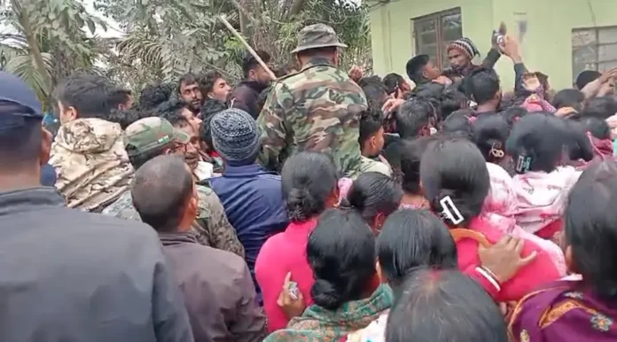 Farmers crowd outside Bahadur Cold Storage in Jalpaiguri as chaos erupts during potato bond distribution on Saturday morning. 28 February 2026.