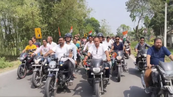 Trinamool supporters take part in a massive bike rally in Rajganj, backing candidate Swapna Barman ahead of the Assembly elections. Wednesday, 18 March 2026.