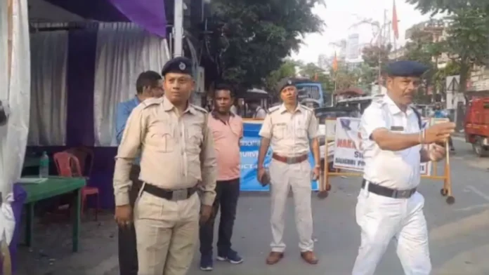 Police conduct naka checking at Panitanki More in Siliguri, inspecting vehicles and documents as part of heightened security measures ahead of the elections. Wednesday, 18 March 2026.