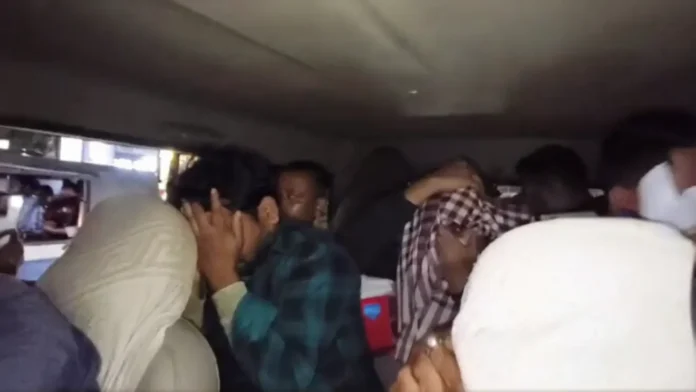 Four accused from Bihar being escorted by police after their arrest from a hotel in Siliguri during a joint operation. Tuesday, 17 March 2026.