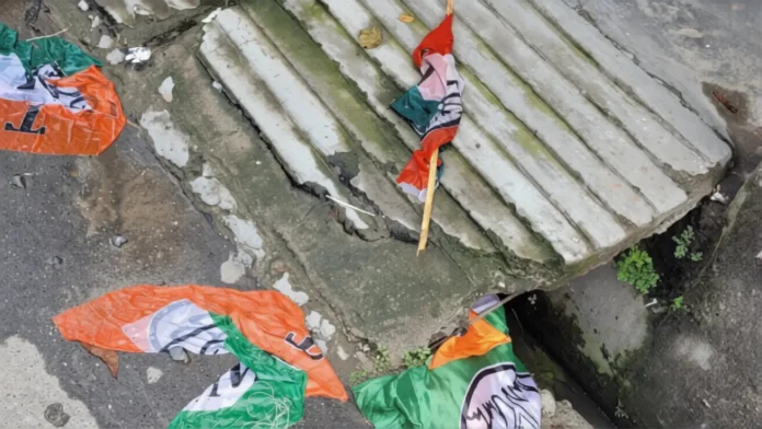 Allegedly torn Trinamool Congress flags near Rathkhola ground in Siliguri spark political row. Friday, 20 March 2026.