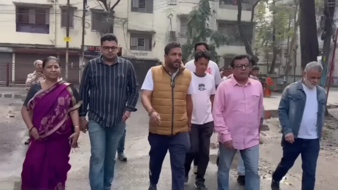 BJP candidate Shankar Ghosh interacts with residents during his campaign in Siliguri’s Mayor’s area, as he engages with morning walkers. Friday, 20 March 2026.