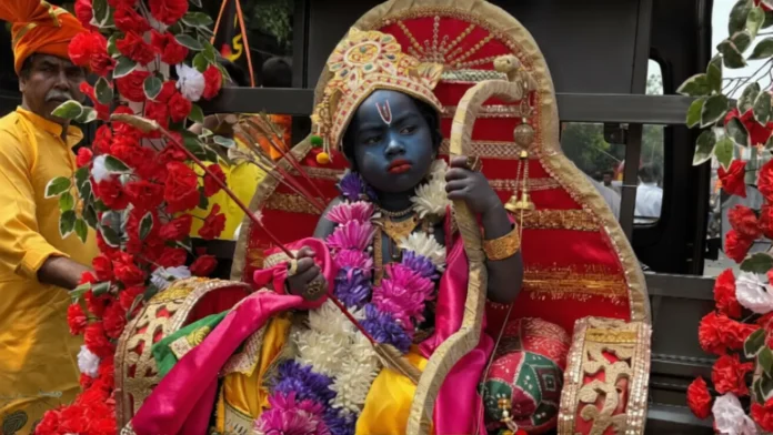 Little Riansh dressed as “Ram Lala” draws smiles and admiration from onlookers during the Ram Navami shobha yatra in Siliguri. Friday, 27 March 2026.