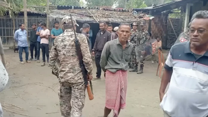 Police and forensic team investigate the crime scene in Jalpaiguri’s Banijyer Hat area after an elderly woman was found decapitated, sparking shock in the locality. Saturday, 28 March 2026.