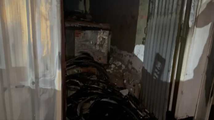 Firefighters douse flames after a blaze broke out at the PWD office near Hospital More in Siliguri on Wednesday night. 15 April 2026.