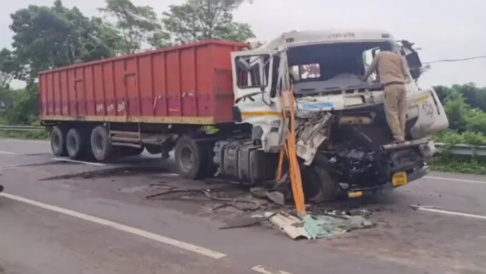 Damaged trailer and container seen after a head-on collision on the Asian Highway near Bagdogra’s Sanyasi Tea Garden area on Saturday morning. Saturday, 23 May 2026.