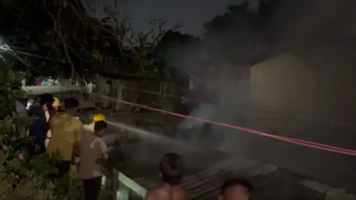 Firefighters battle the blaze after a massive fire gutted five houses in Siliguri’s Burdwan Road area on Thursday night. 14 May 2026.