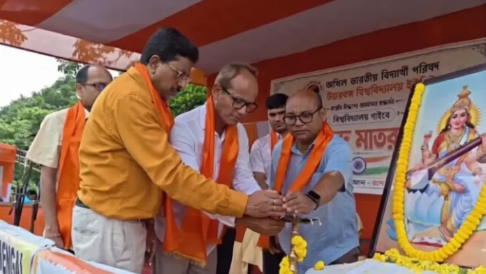 Students, faculty members and university officials during the ‘Vande Mataram’ programme organised at North Bengal University campus in Siliguri. Monday, 25 May 2026.