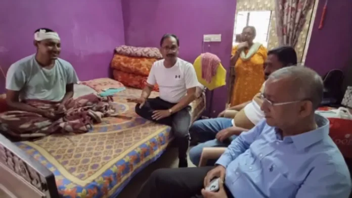 Siliguri Mayor Gautam Deb visits injured TMCP student leader Vivek Jha following the clash at Siliguri College over an admission help desk issue. Wednesday, 27 May 2026.